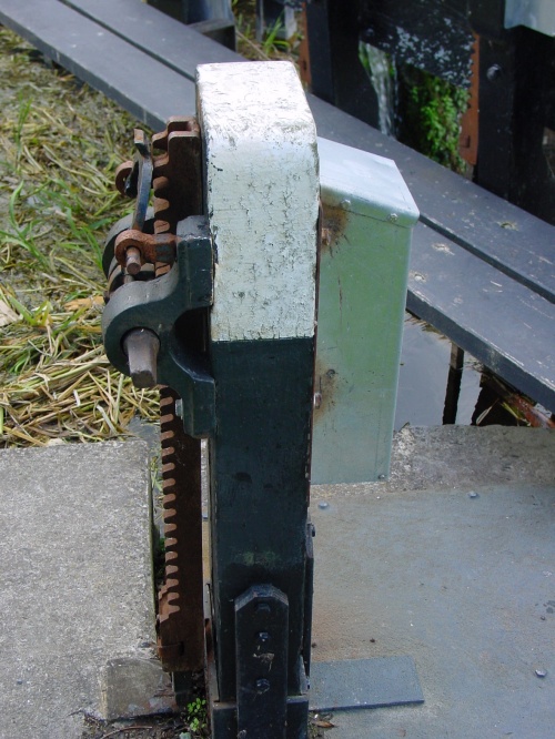 The metal housing contains the locking gear